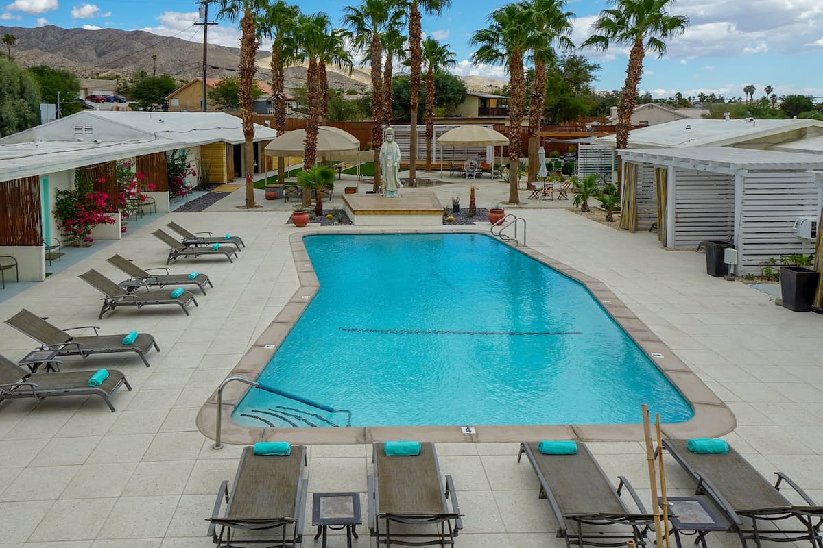 Outdoor hot spring pool with loungebeds at the o spa resort california