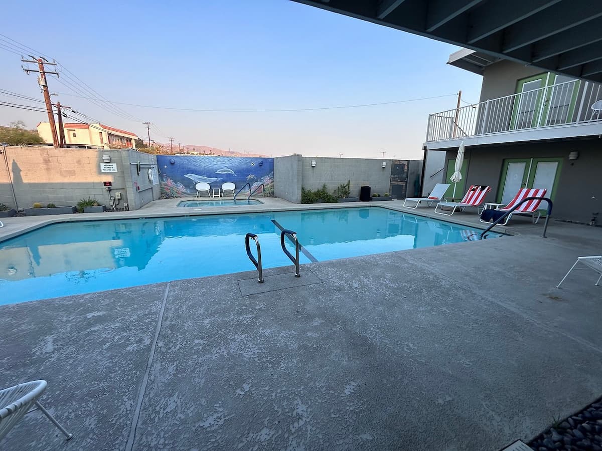 Outdoor hot spring pool and spa hotel at desert hot springs inn california