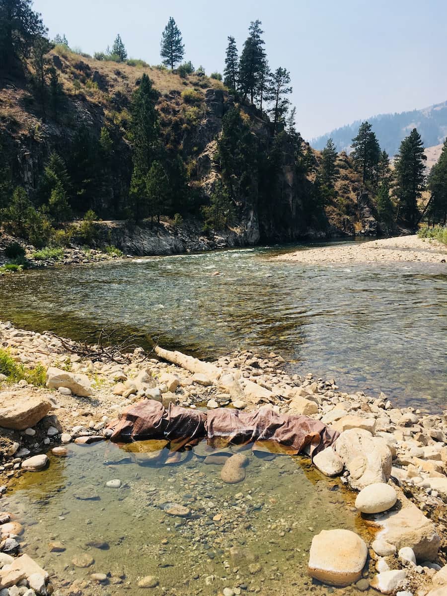 Riverside natural hot spring pool at sheep creek bridge hot spring idaho