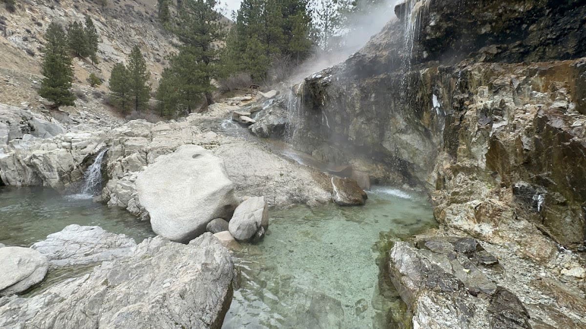 natural riverside hot spring pol in a rocky valley setting at panther hot springs idaho