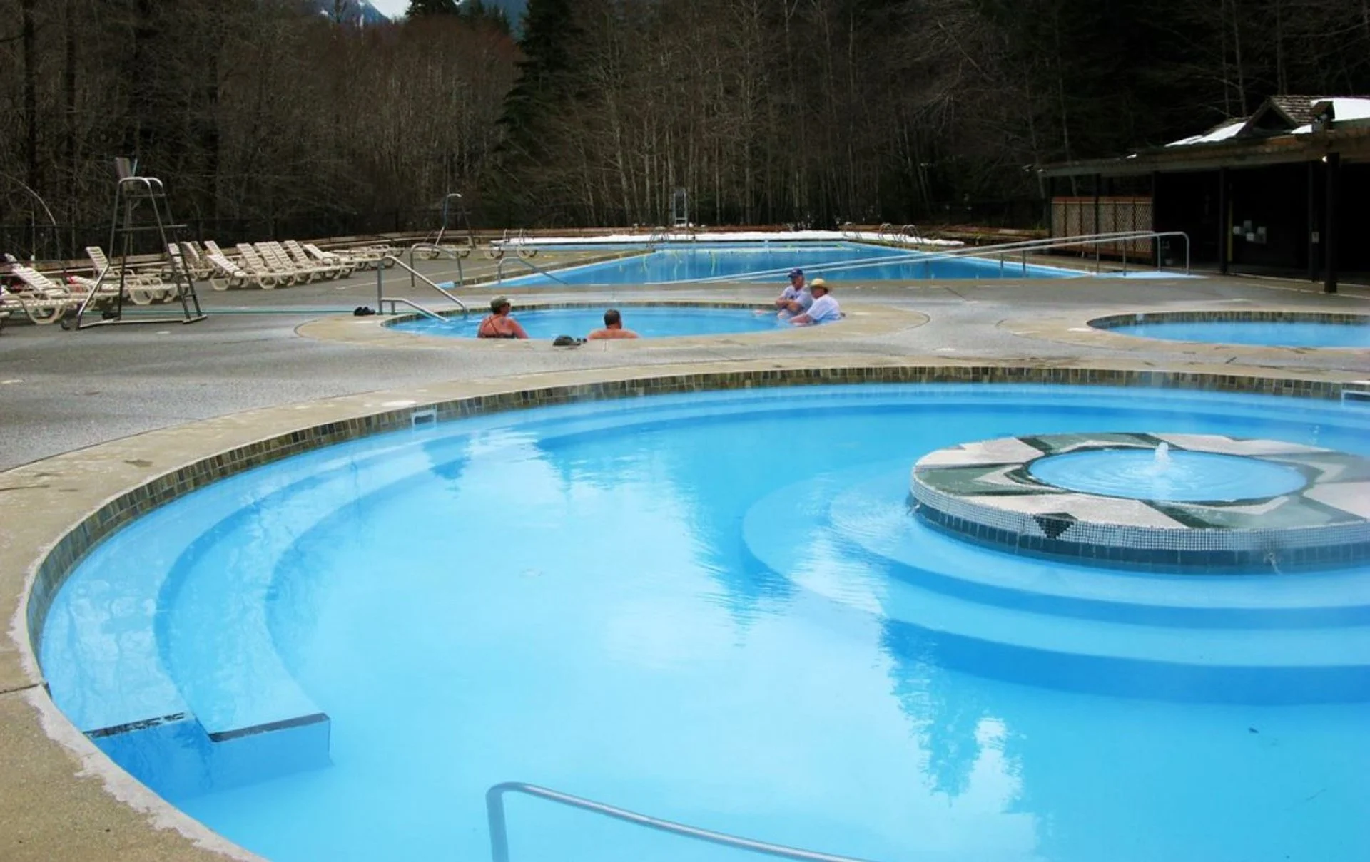 Outdoor turquoise water hot spring pool at sol duc hot springs in washington