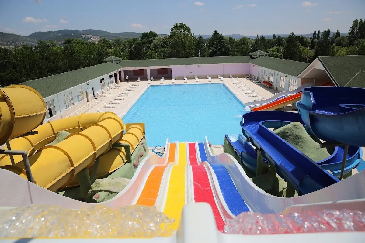 Outdoor water slides and thermal pool in the background at emet thermal springs in turkey
