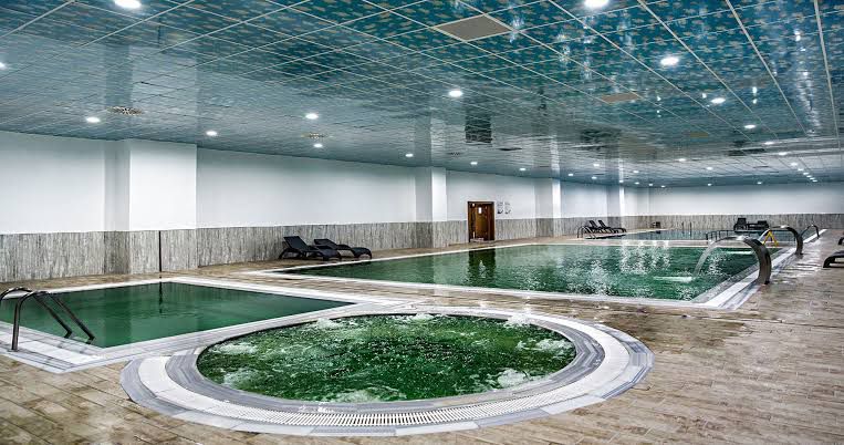 Indoor multiple hot spring pools and tubs at cermik thermal springs in turkey