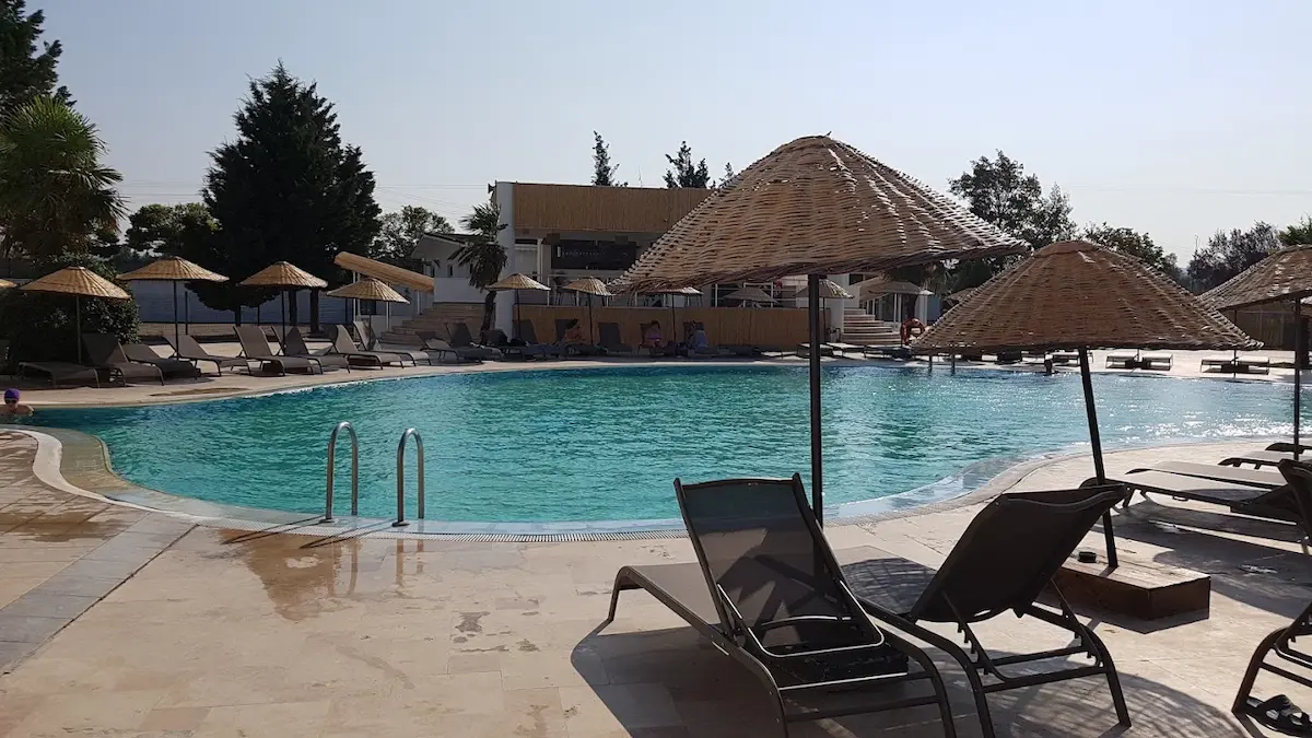 Outdoor thermal pool and sun loungers at onhann thermal resort and spa in turkey