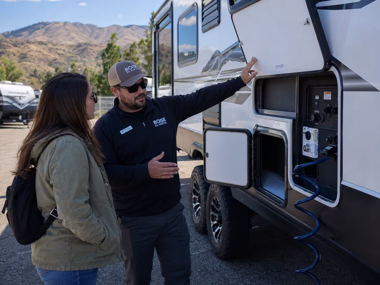 Renter checking a Boise camper before a trip