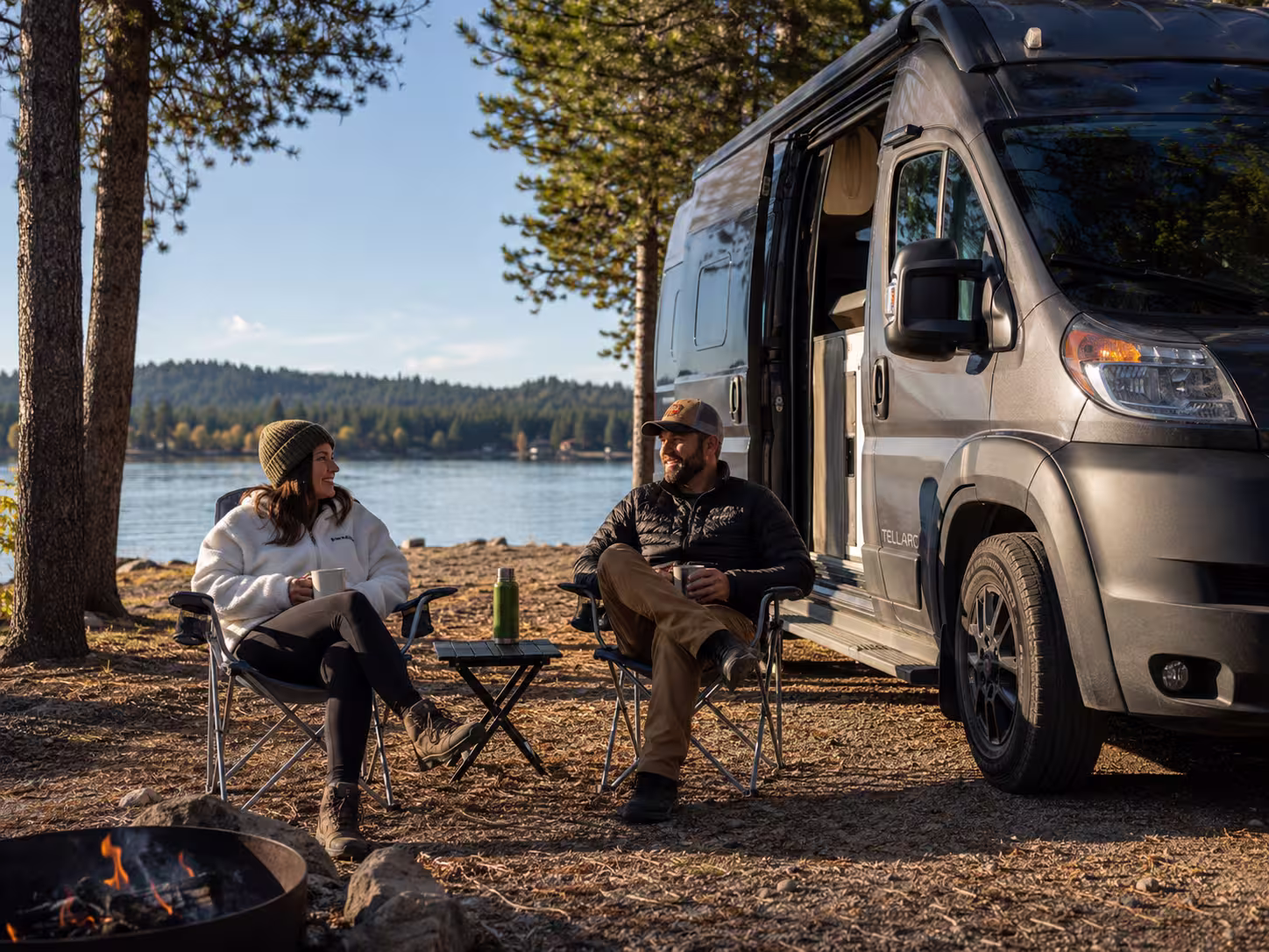 Couple with Class B van at McCall lakeside campsite