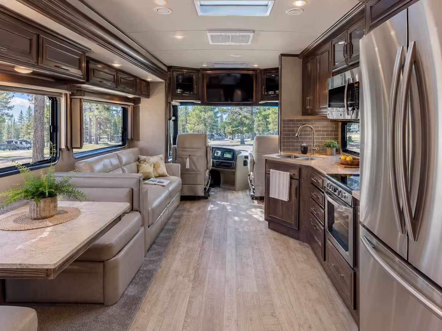 Class A motorhome interior with slide-out kitchen and living area