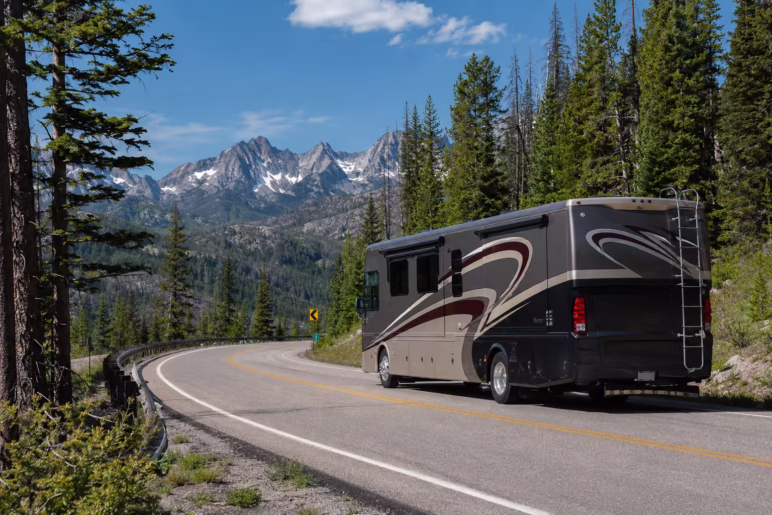 Luxury RV driving a mountain route toward the Sawtooths from Boise