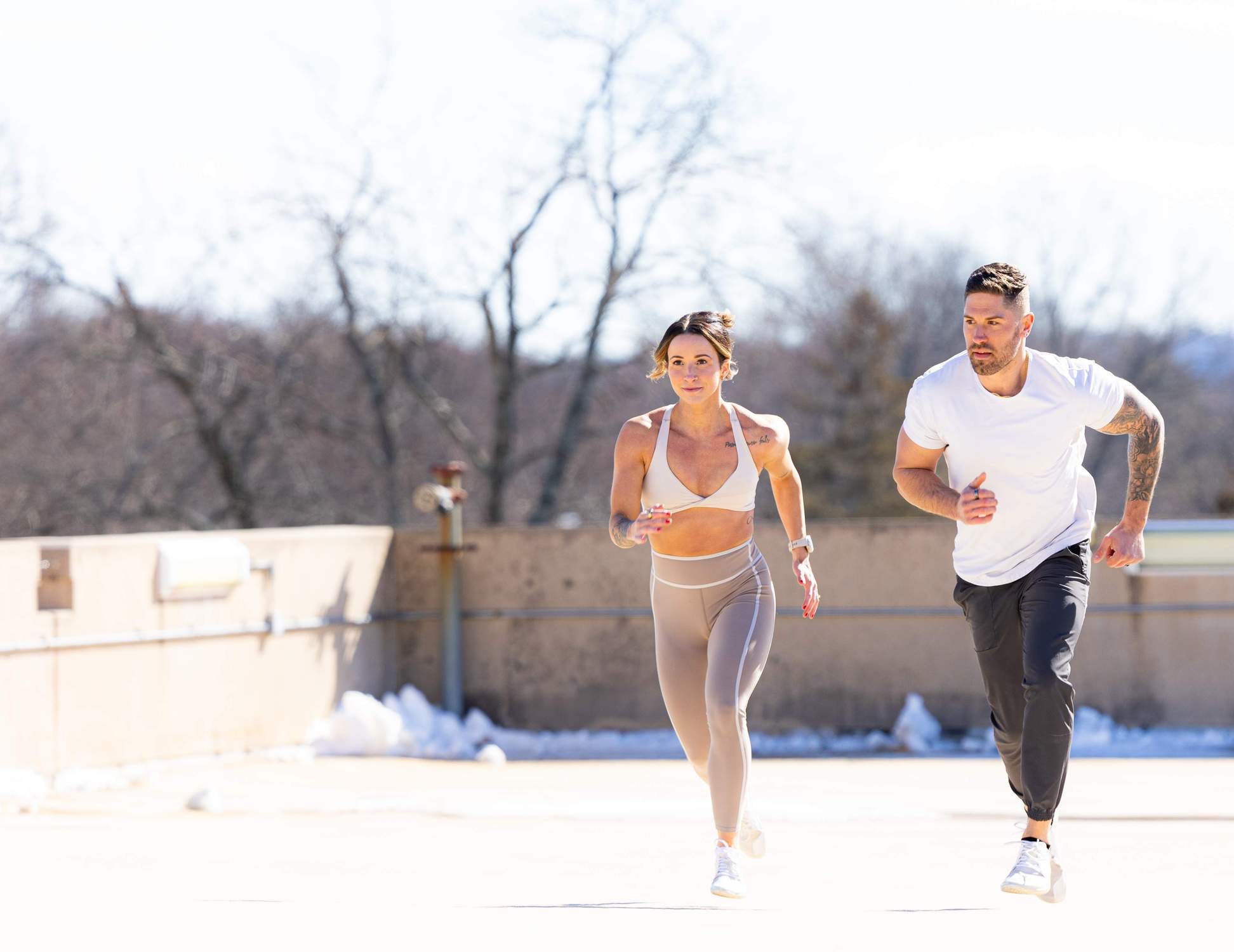 couple going for a run in the snow
