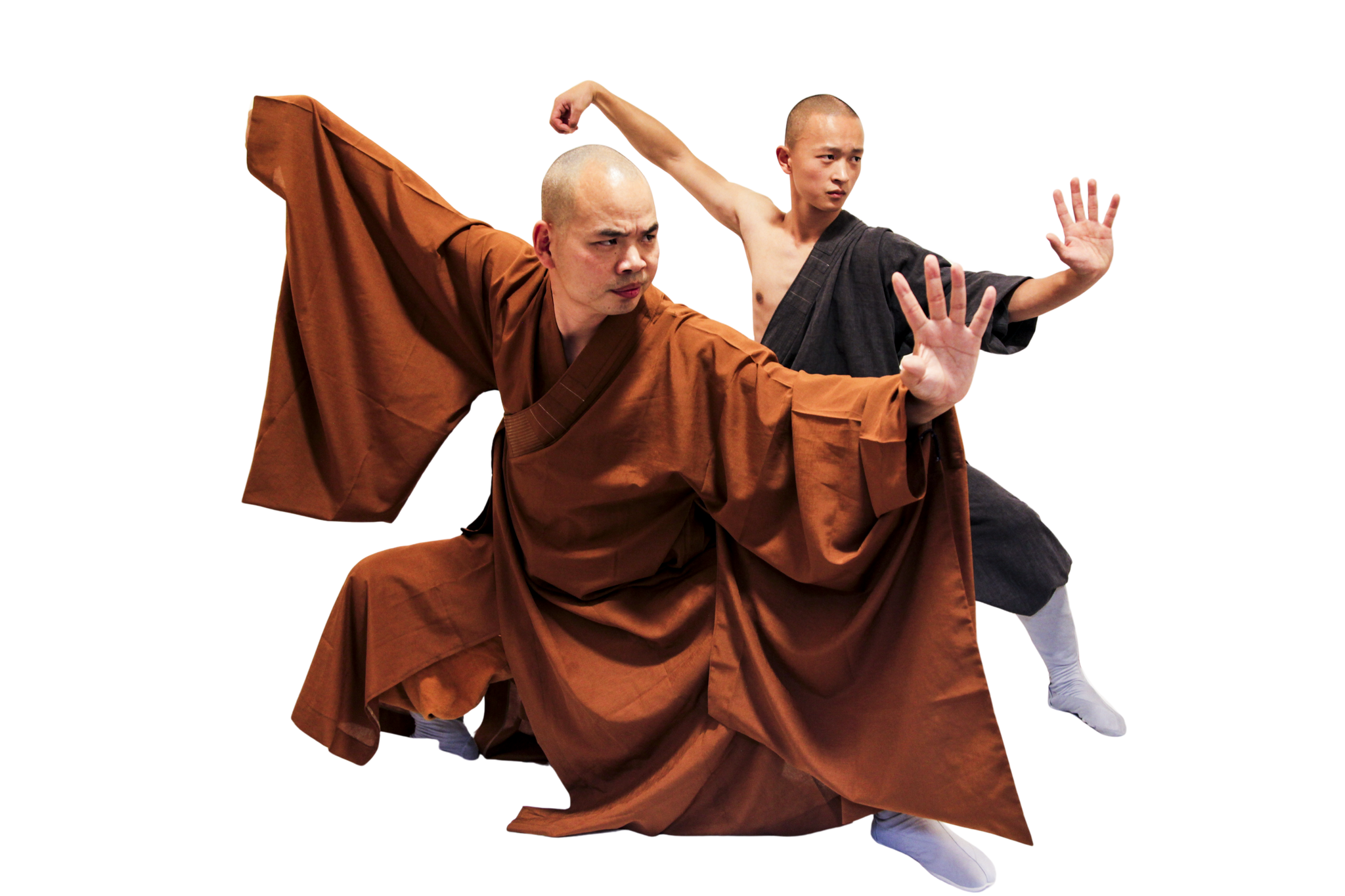 martial art london Shaolin Xiu Two shaolin monks in traditional robes striking martial arts poses.