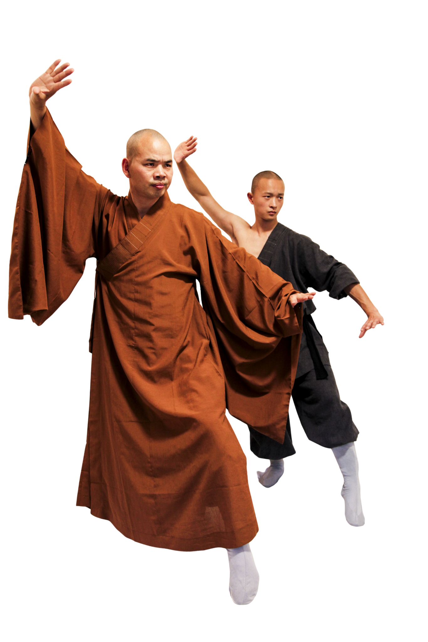 martial art london Shaolin Xiu Two male martial artists performing synchronized kung fu poses in traditional robes.