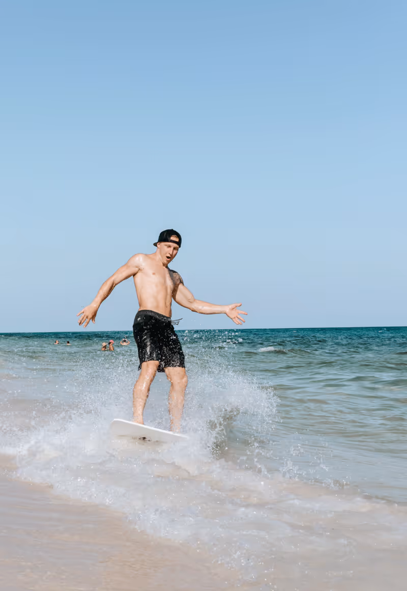 Skimboarding at Pensacola Beach