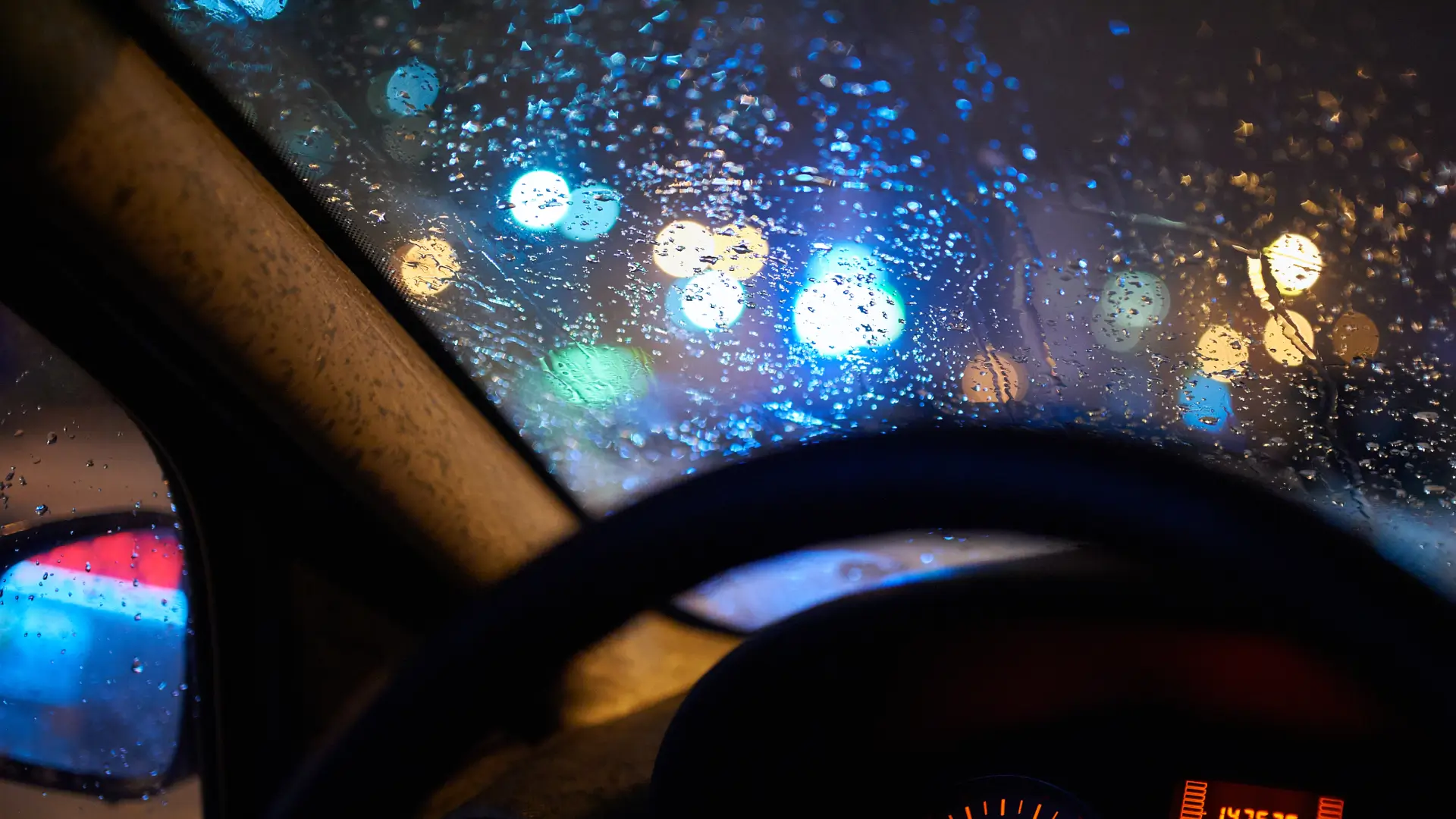 Employee driving in the rain