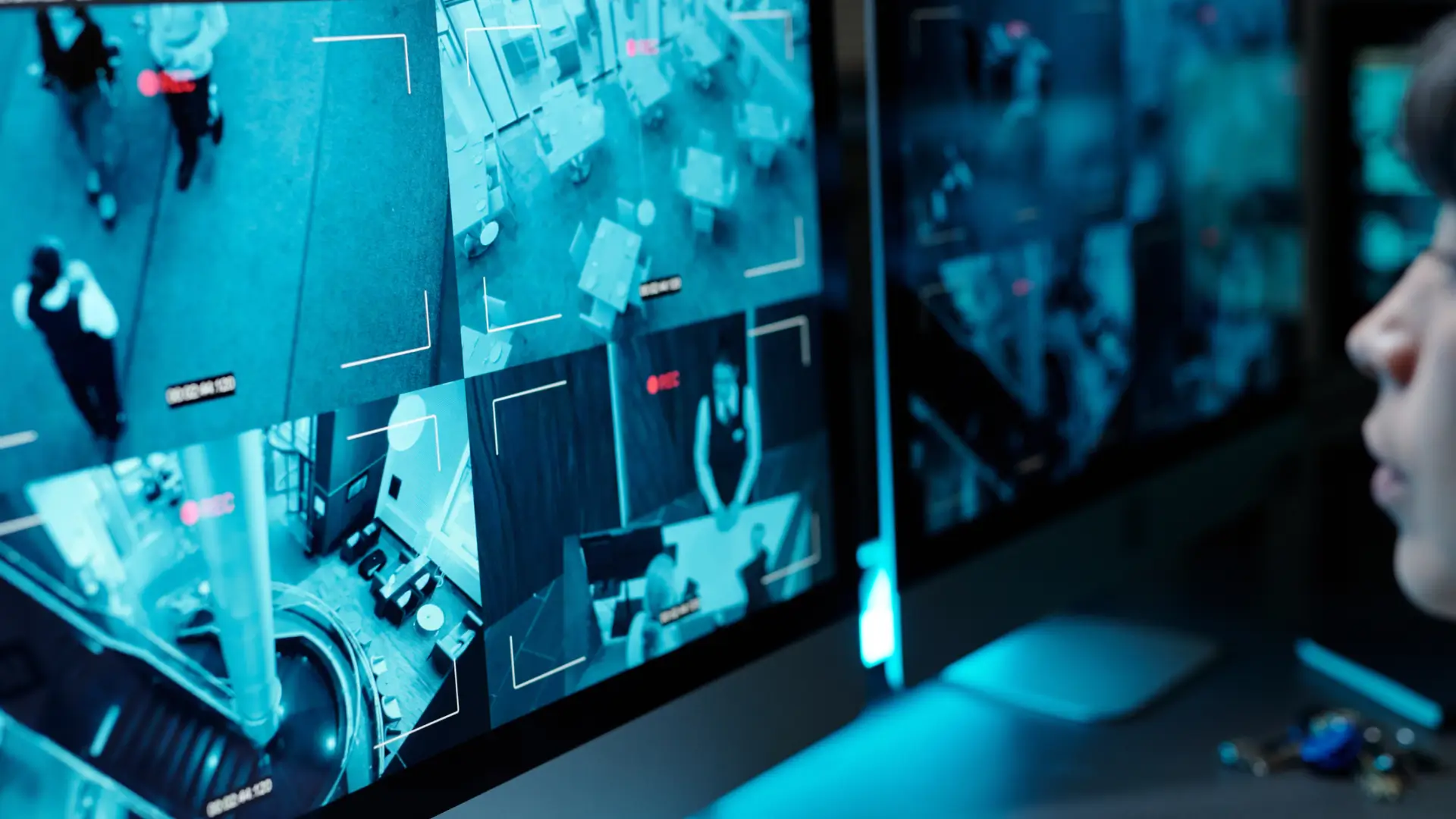 A monitoring center agent reviewing CCTV footage