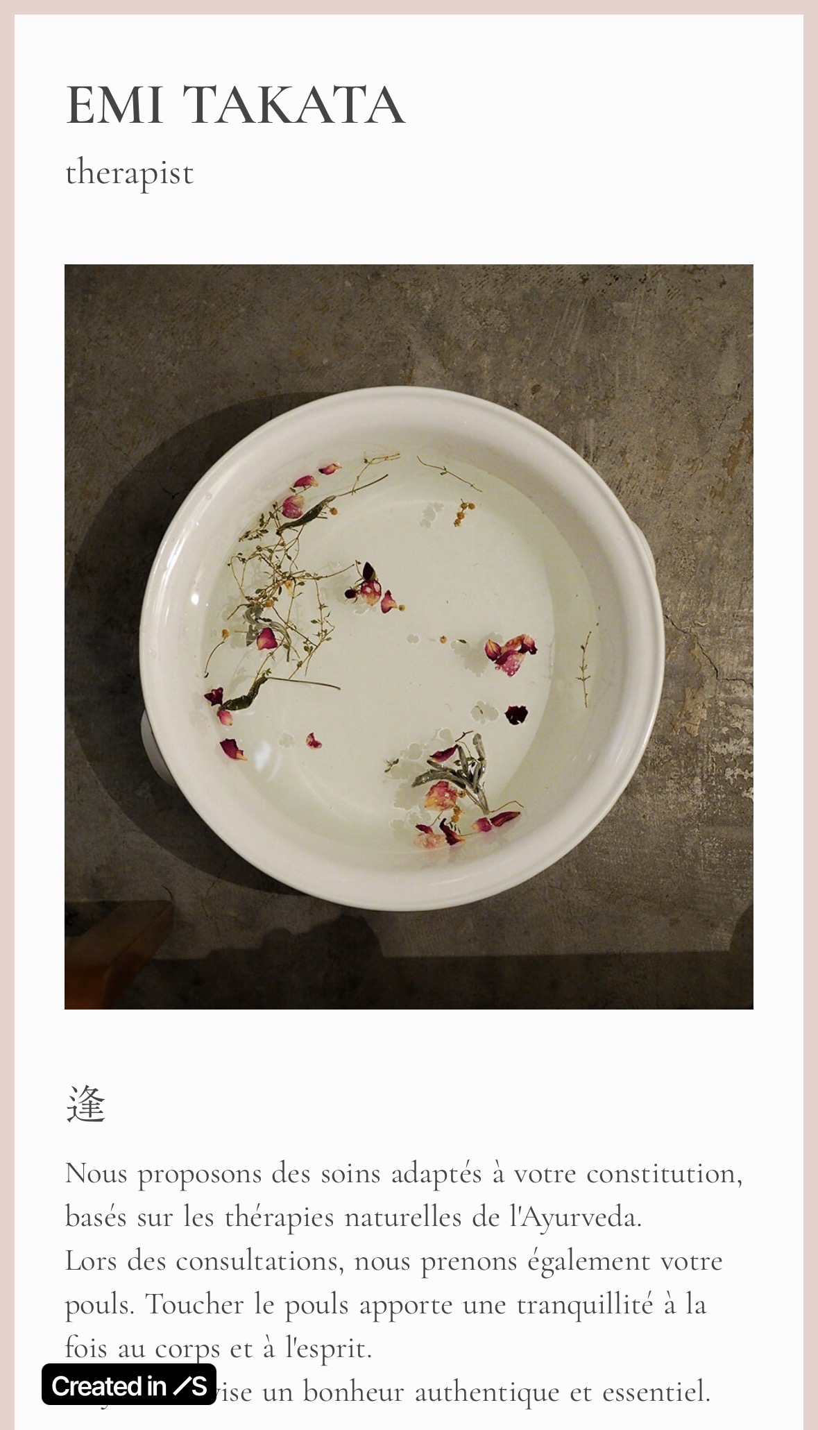 alt="White ceramic bowl with floating dried flower petals on concrete surface for Emi Takata therapist website"