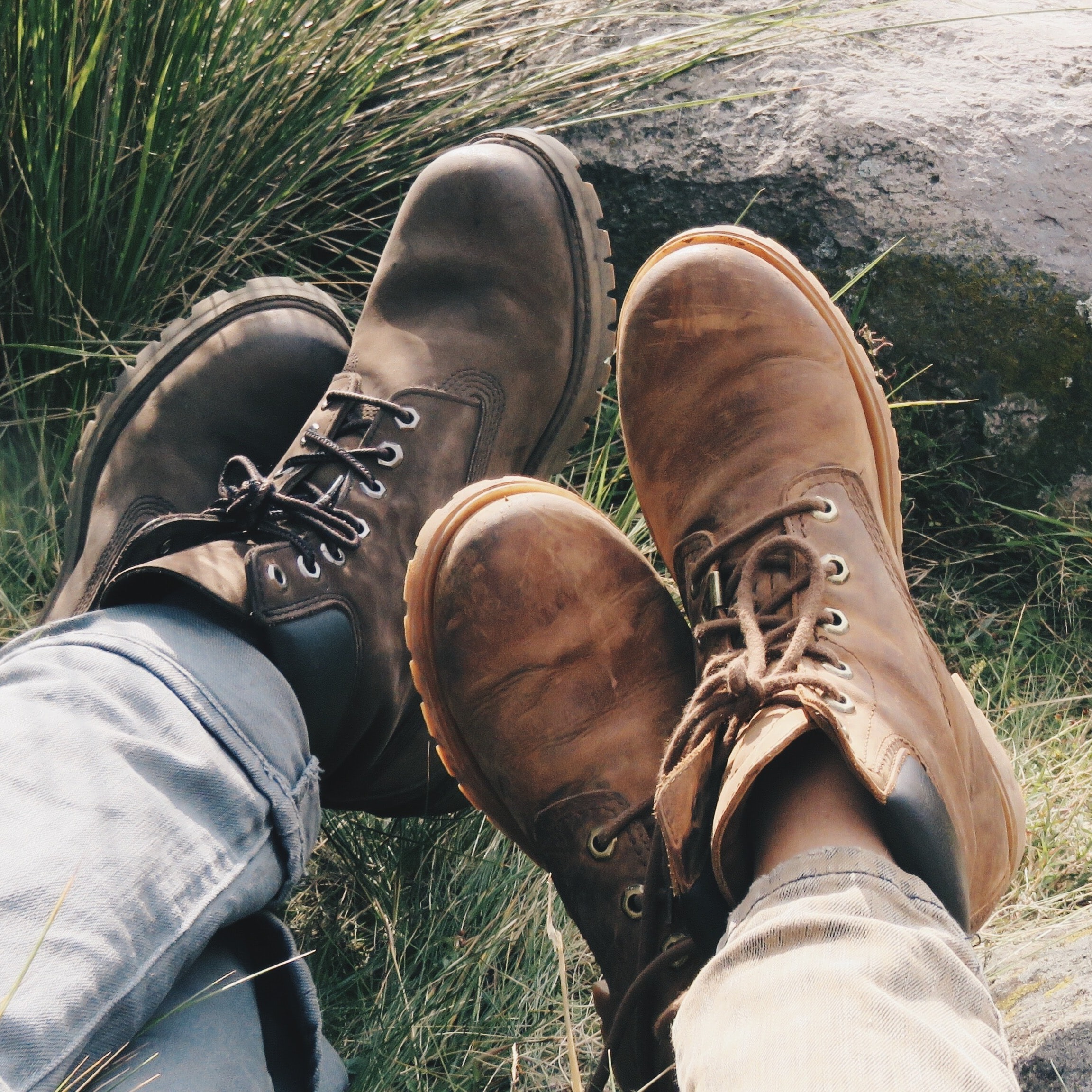 Two pairs of hiking boots next to each other