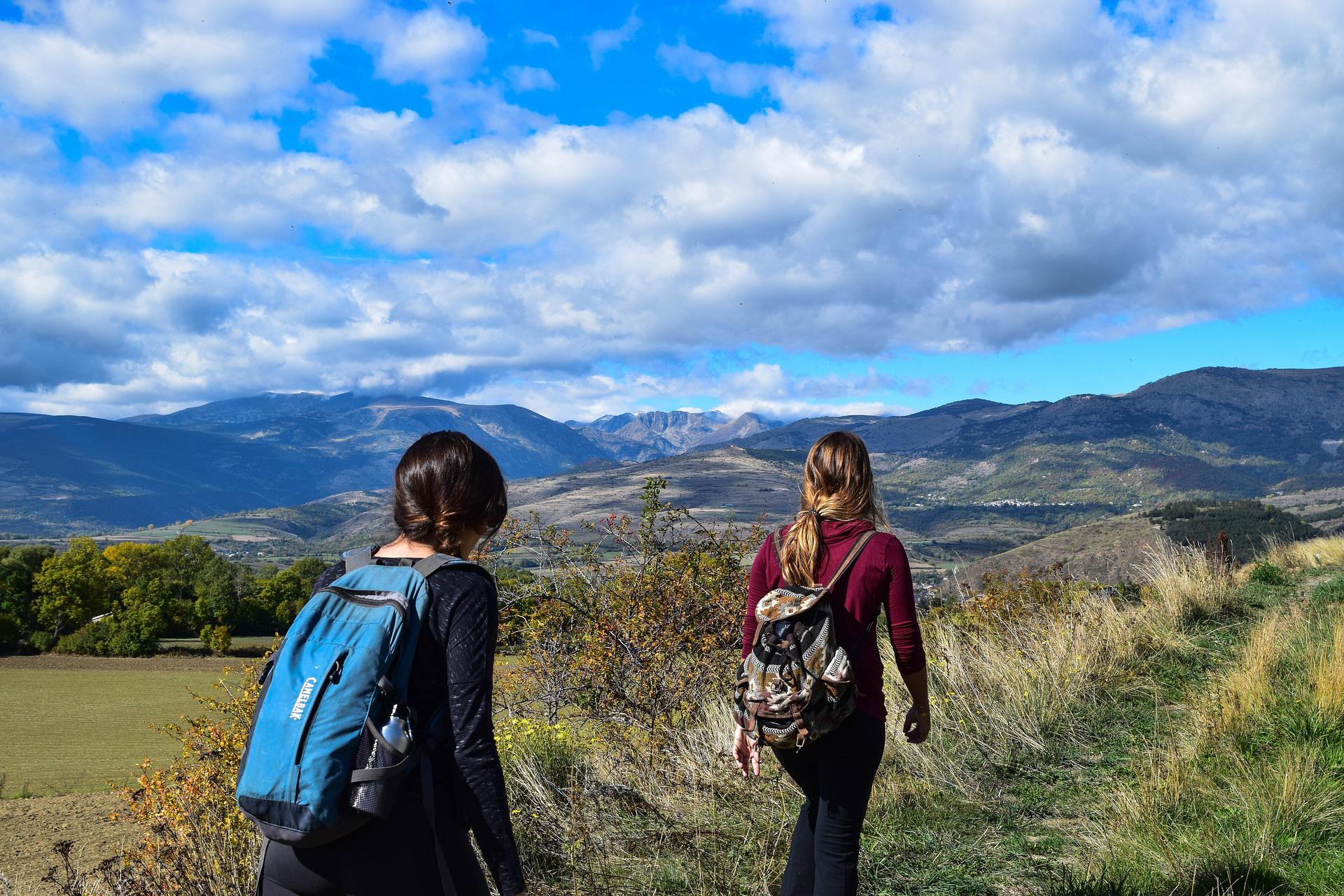 Two women hiking in countryside