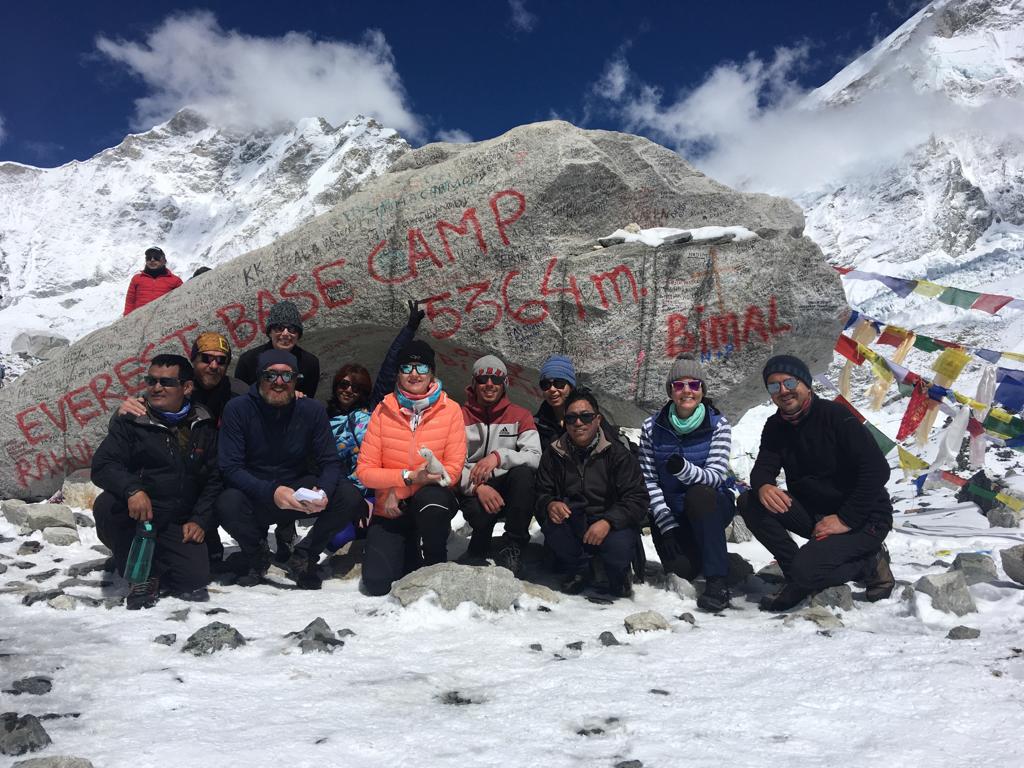 Karen. EBC trek group pic Base Camp rock 2023
