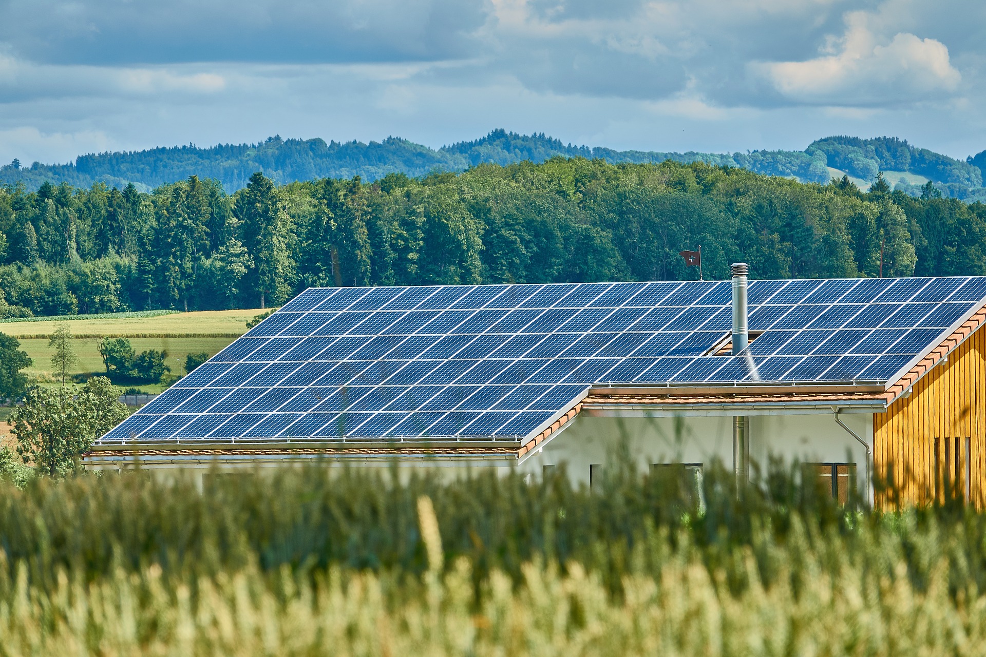 Roof of solar panels in countryside