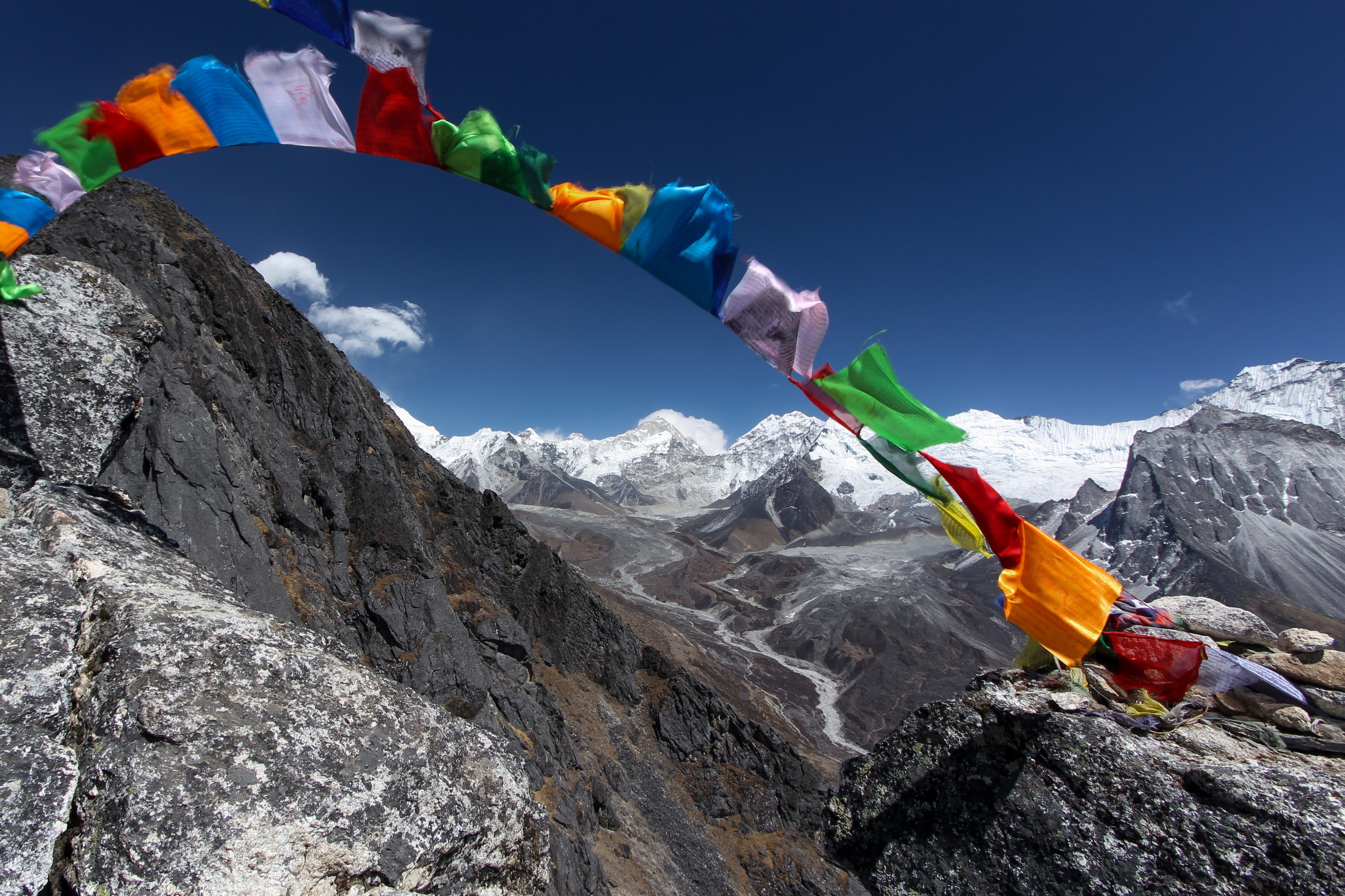 Everest Base Camp route and Tibetan prayer flags blowing in wind