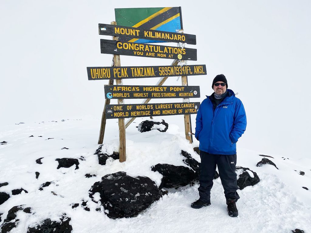 Dwayne-Perry-Kilimanjaro-Summit-Photo-Sign-1024x768.jpg