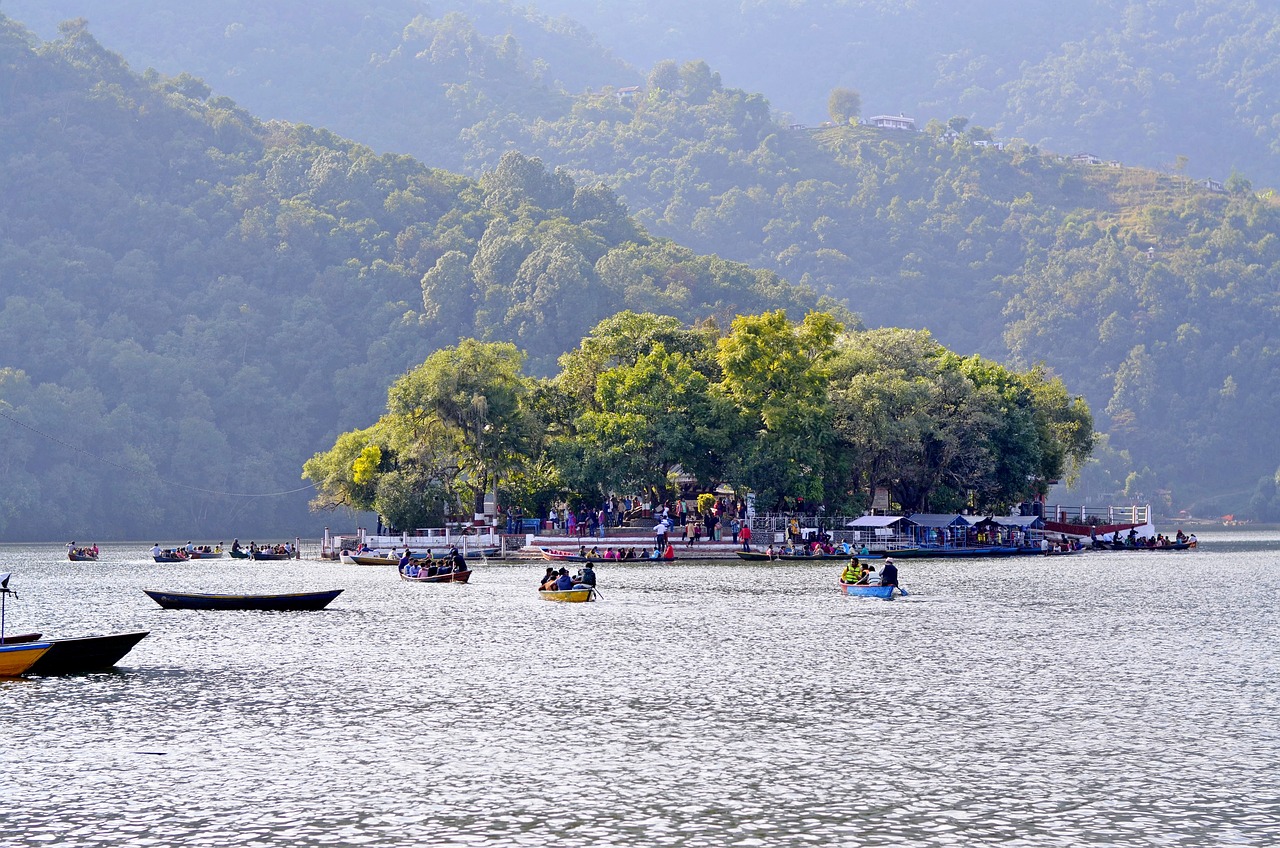 Phewa Lake Hindu Temple Pokhara canoes Nepal