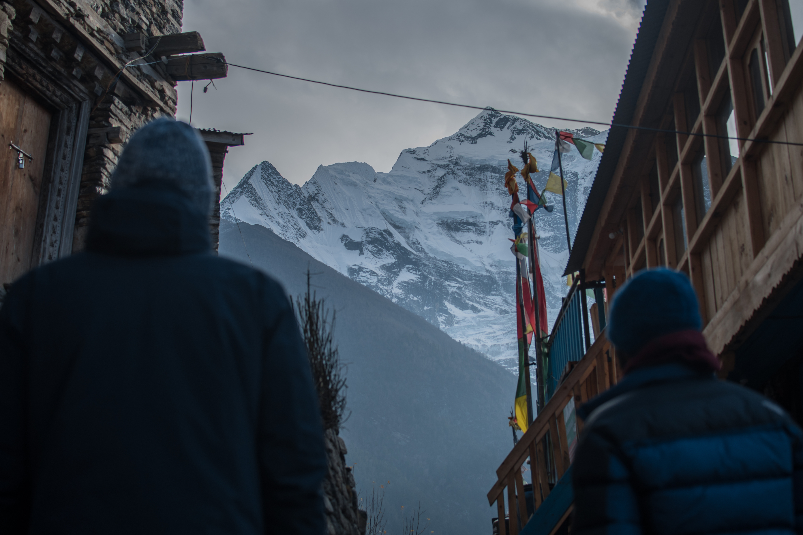 Ours. S. Street-level view of Himalayas in Upper Pisang, Annapurna Circuit, Nepal