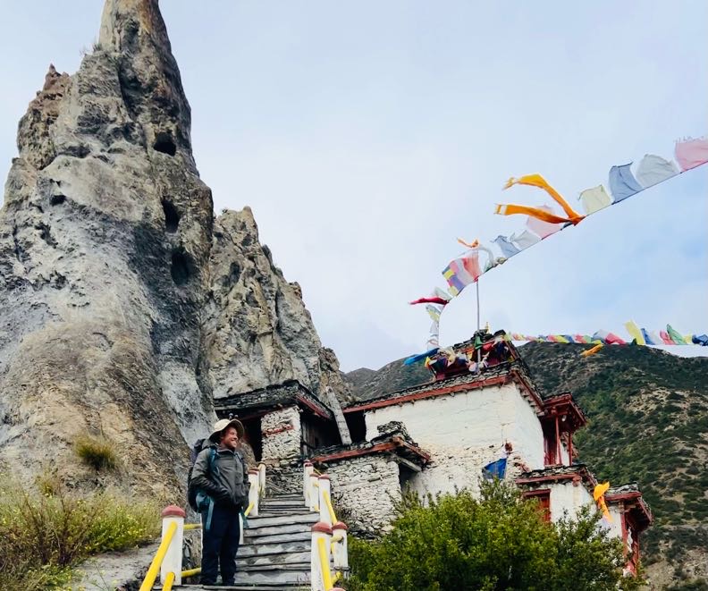 Hala Macknight. Annapurna Circuit building and prayer flags