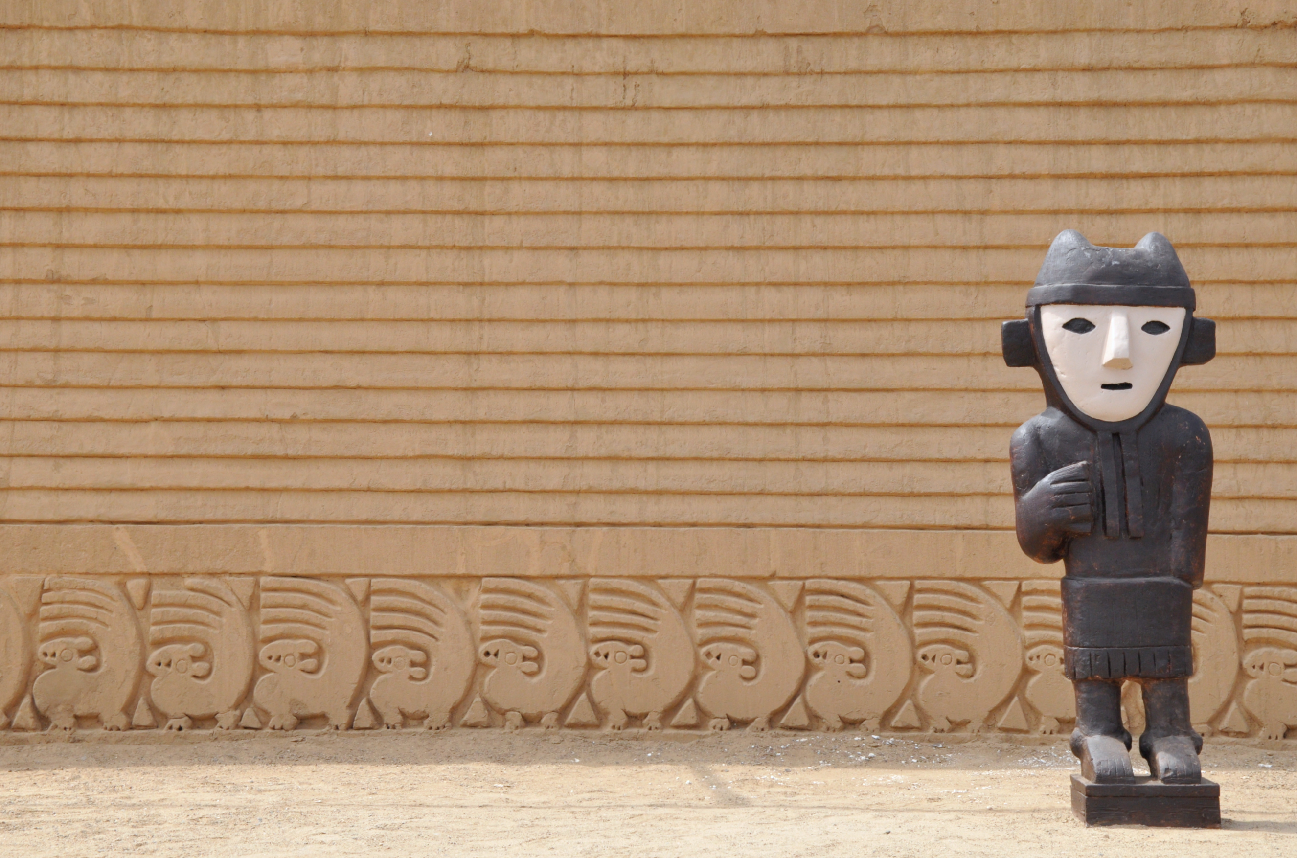 Chan Chan archaeological site with anachronistic Inca statue