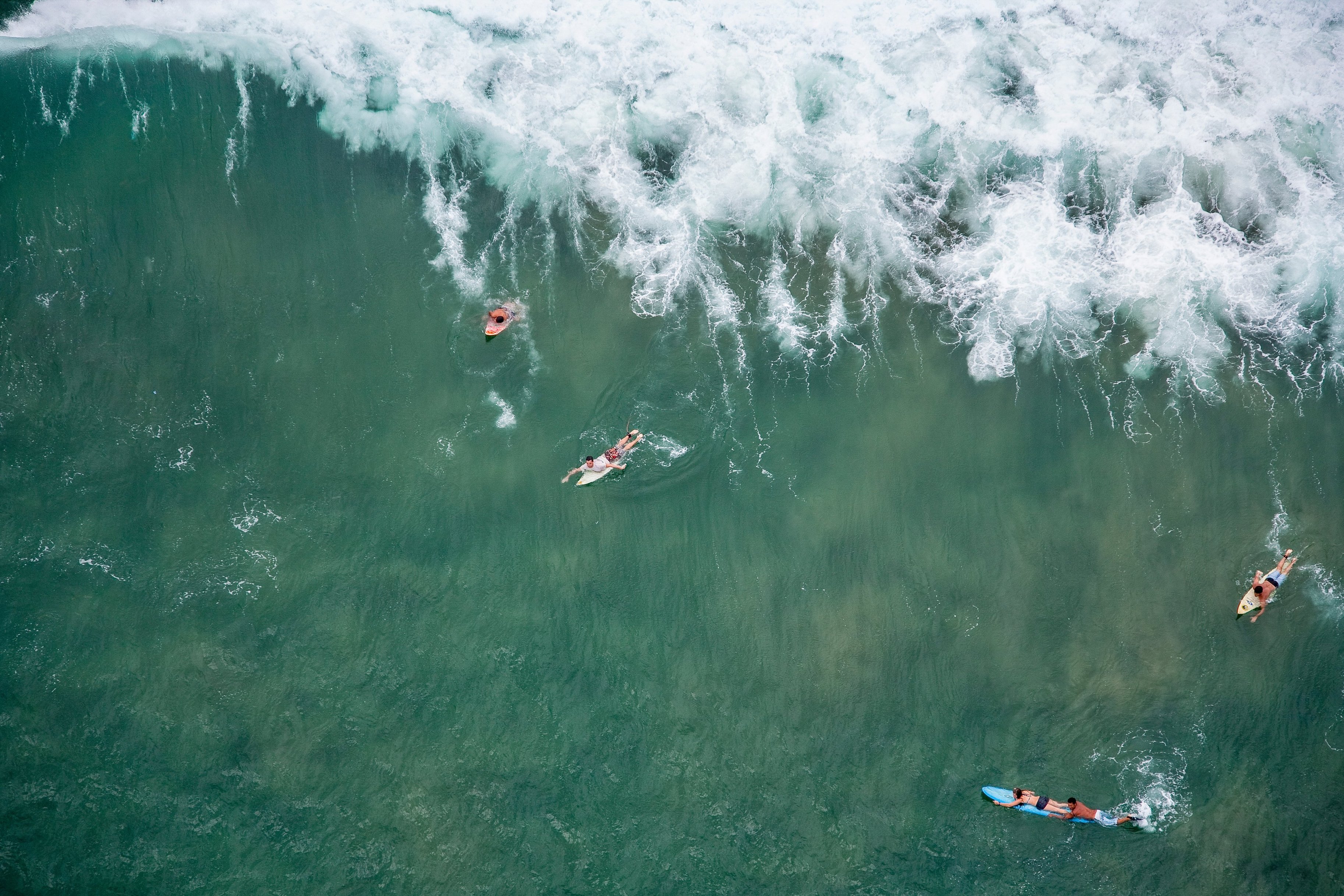 Surfers enjoy the great waves at Mancora 