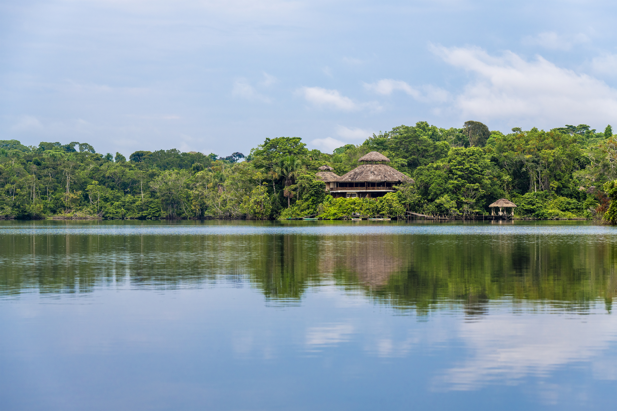 Amazon rainforest river lodge. Reflection of an amazon rainforest lodge
