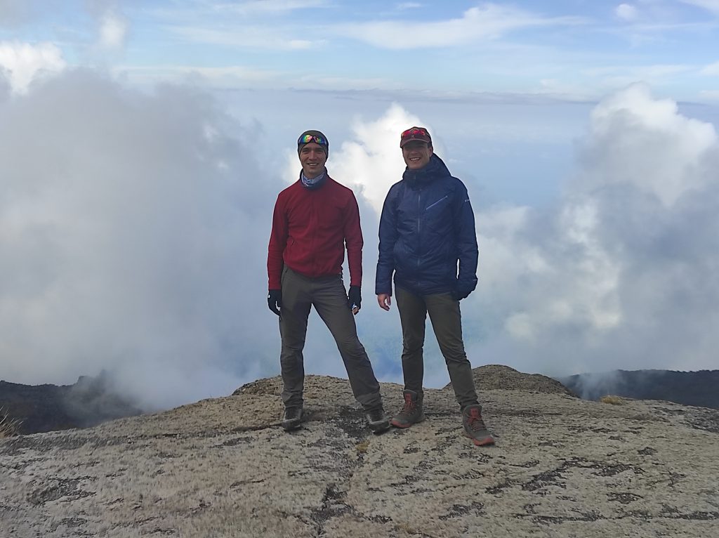 Two-men-on-Kilimanjaro-with-clouds-behind-them-1024x766.jpg
