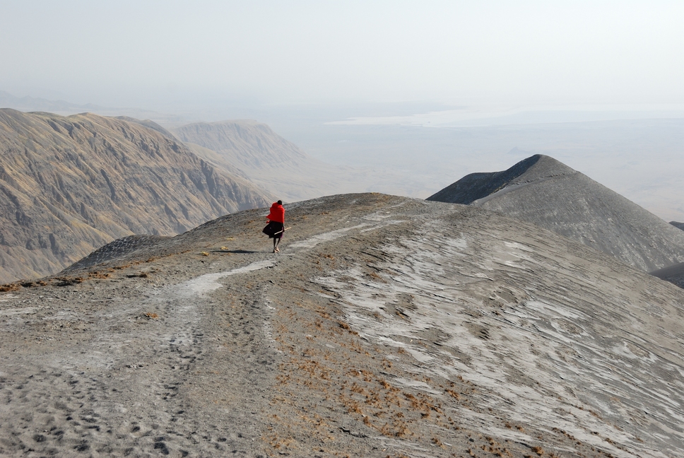 Masai-man-on-hills-covered-by-volcanic-ashes-Great-Rift-Valley-1.jpg