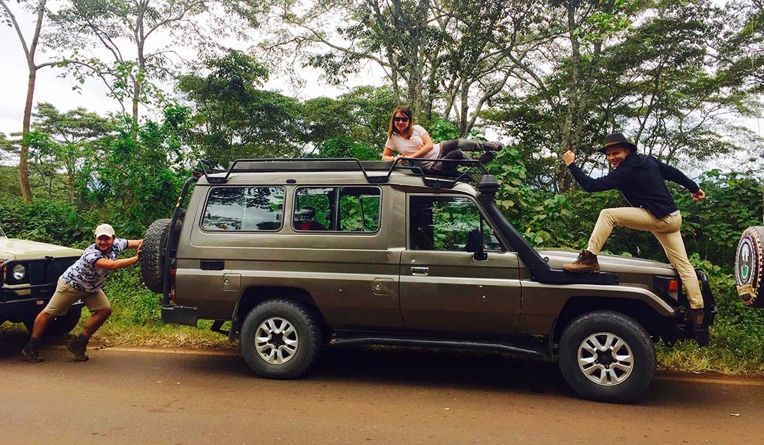 Friends on safari car having fun