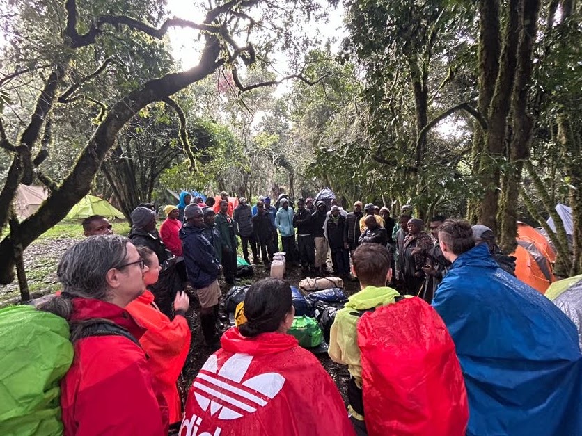 Romy. Group pic, briefing, forest, Kilimanjaro
