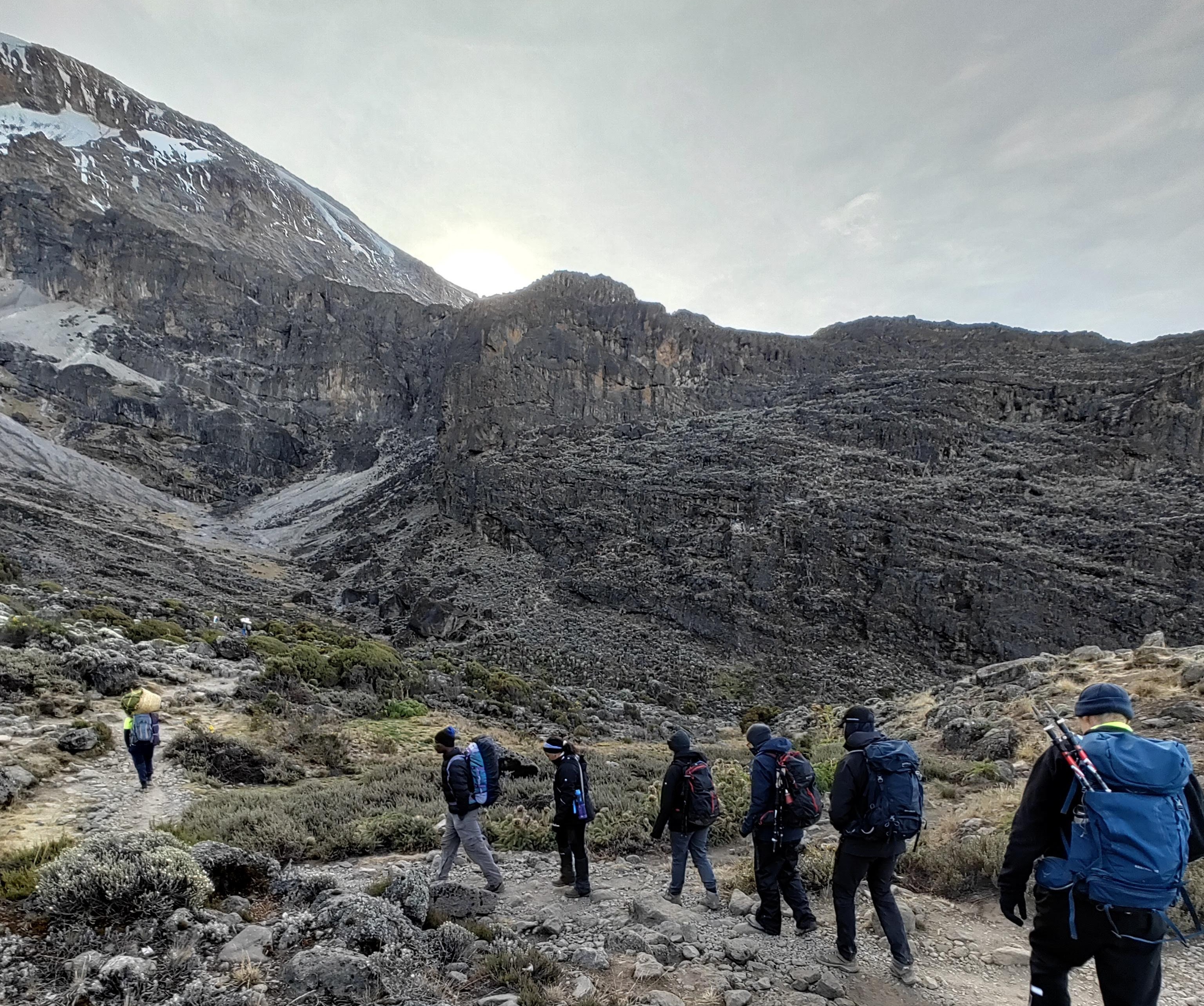 Frederik Mann. Climbers heading to Barranco Wall on Kilimanjaro