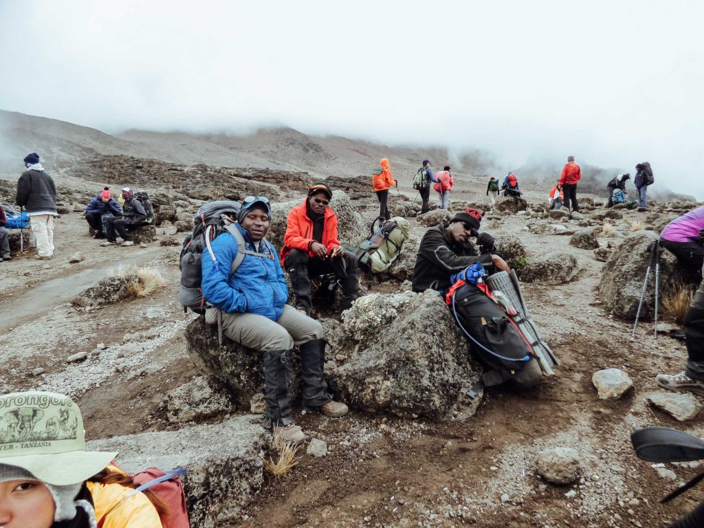 Kilimanjaro-guides-having-a-rest-and-snacks-1024x768.jpg