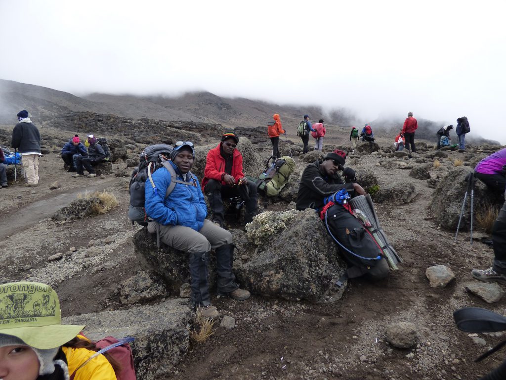Kilimanjaro-porters-taking-a-rest-1024x768.jpg