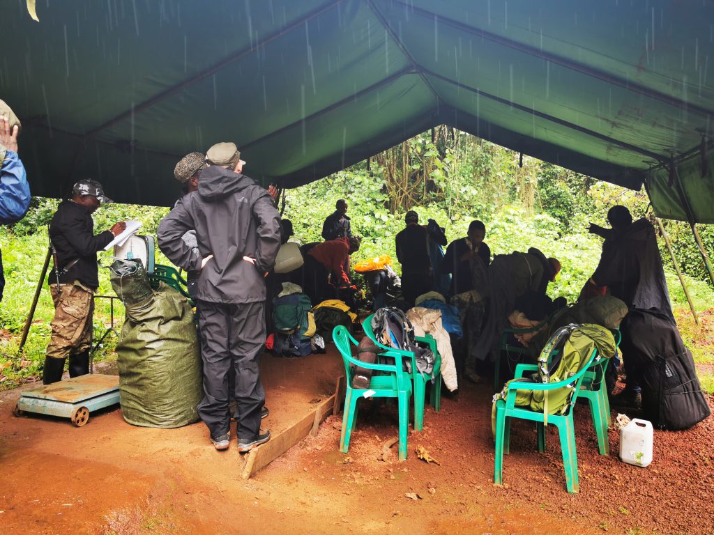 Porters-on-Kilimanjaro-under-a-tarp-1024x768.jpg