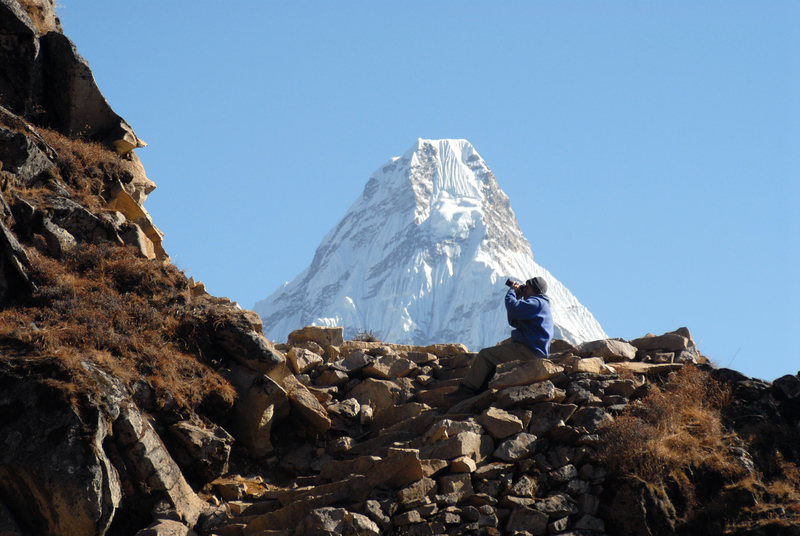 Ours. EBC trek, Ama Dablam, man photographing