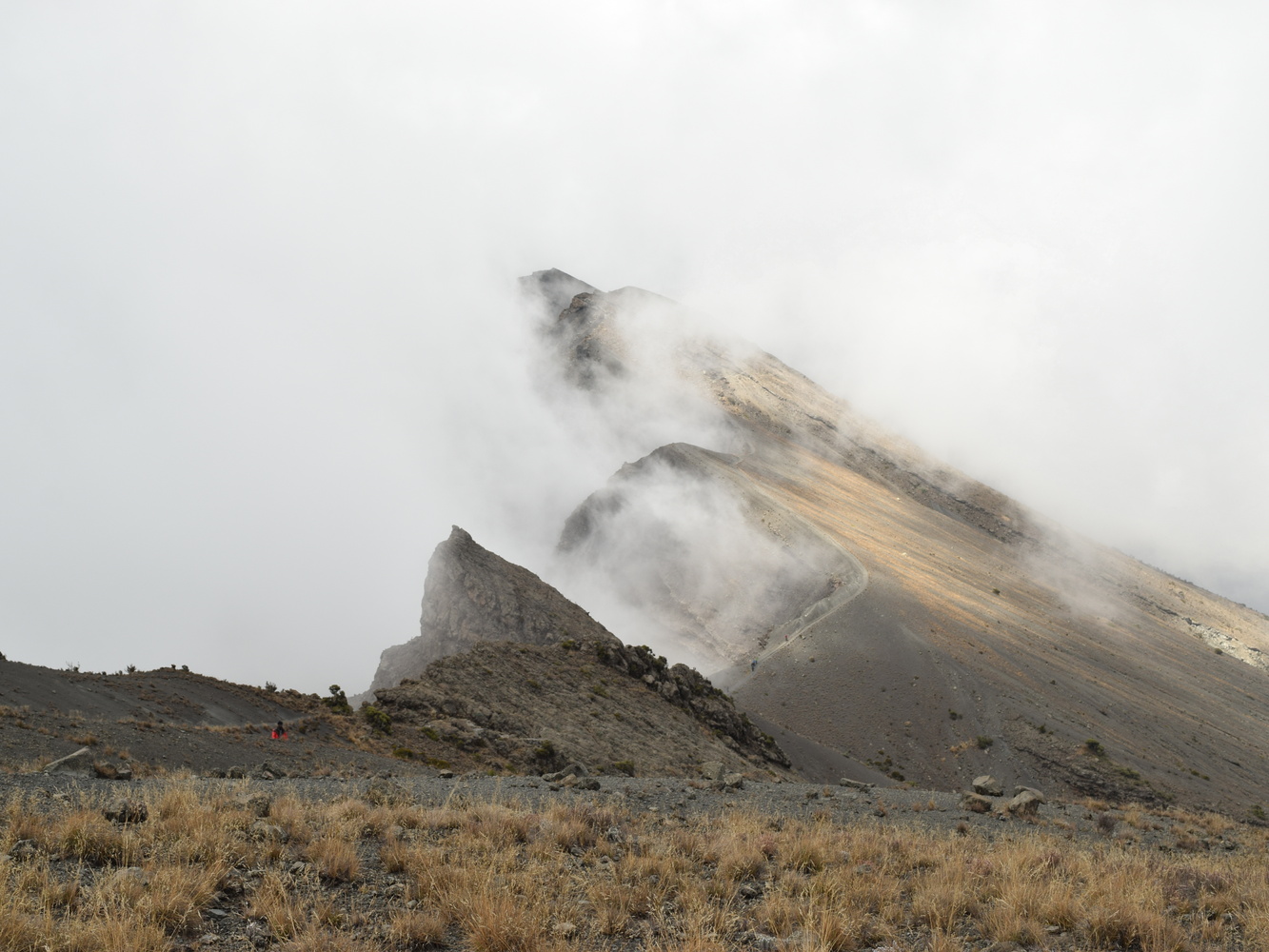Ours. Side of Mt Meru crater draped in mist