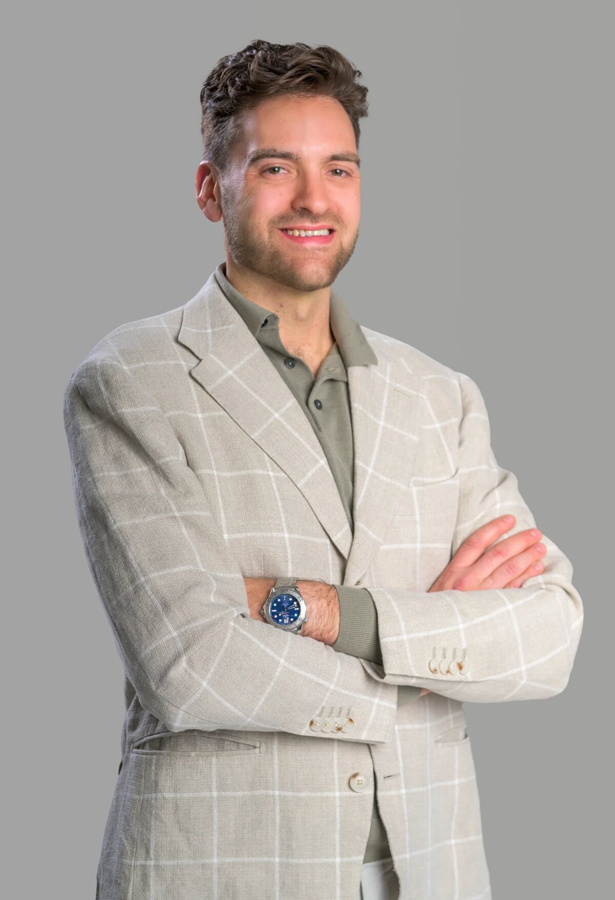 Dylan Unger, Venyx Injury Law Founder and Motorcycle Racer, in casual blazer