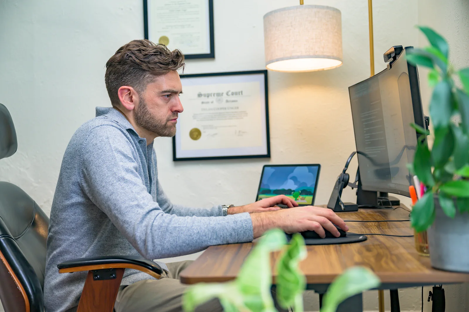 Dylan Unger reviewing a truck accident client file at his desk
