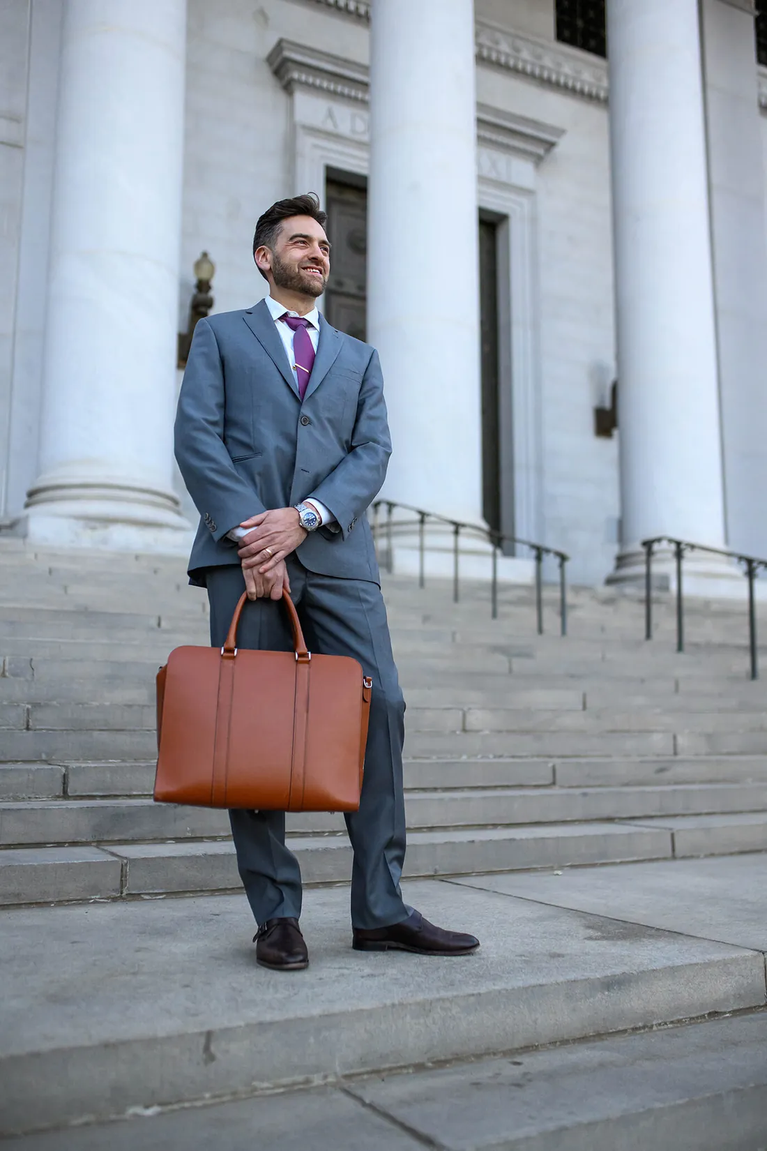 Dylan Unger, Denver truck accident attorney, on the courthouse steps