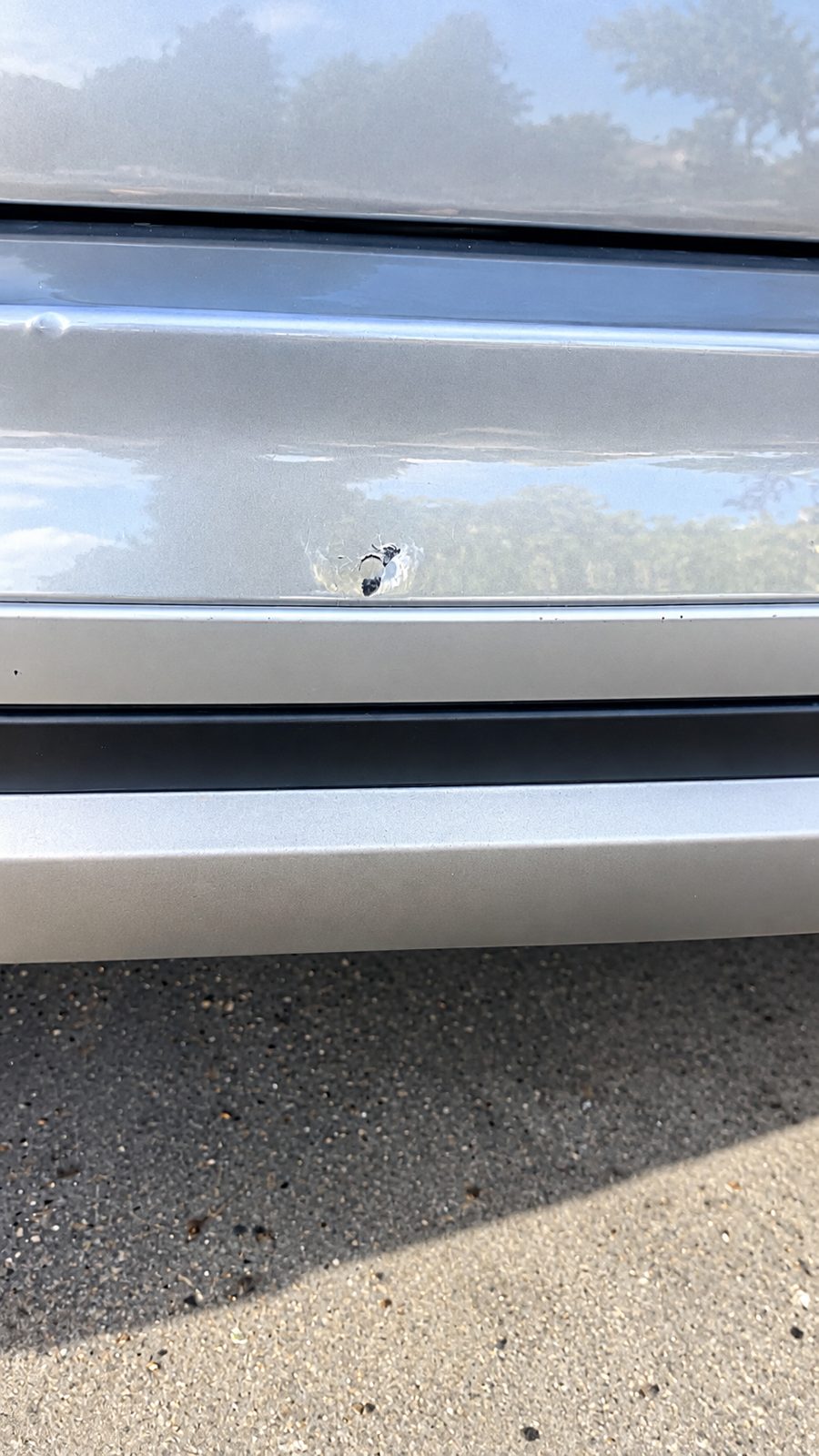 Rear bumper damage after a rear-end collision