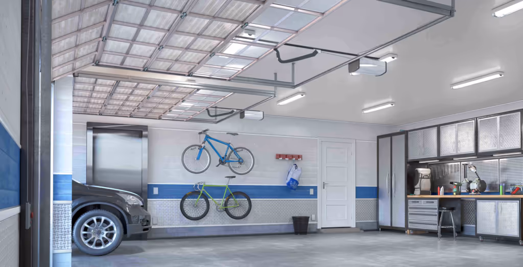 Clean, organized garage with two bicycles mounted on the wall, a black car partially visible, and a workbench with cabinets on the right.
