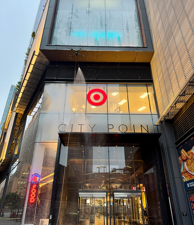 Exterior glass facade of a building with a red Target logo and the partial text 'CITY POIN' visible below it.