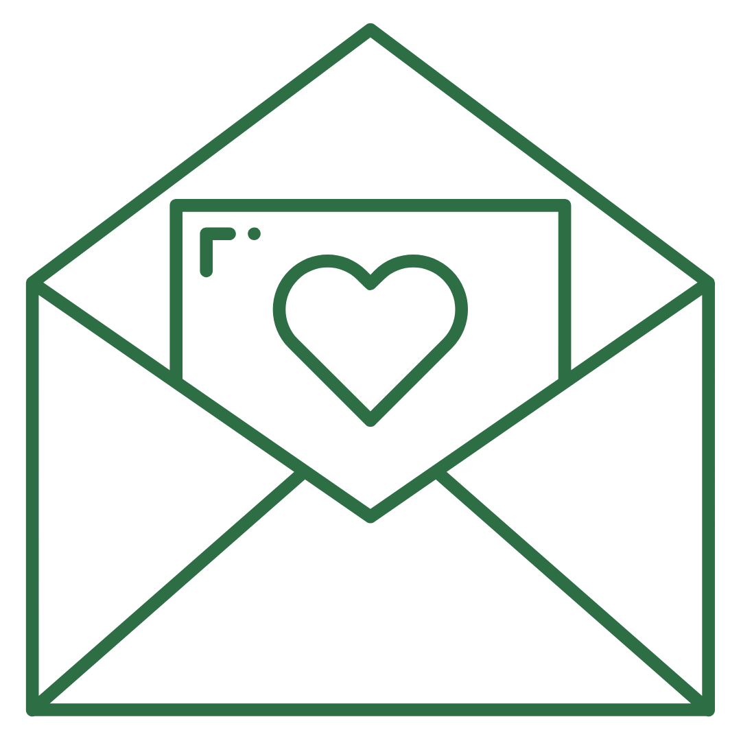 Open envelope containing a card with a heart symbol.