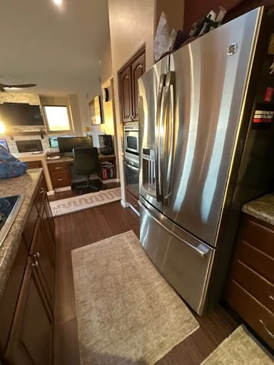 Professional move in/out cleaning service in Tucson, AZ - Tucson Supreme Clean cleaner cleaning refrigerator