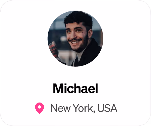 Smiling man with short curly hair and tattoos in a circular frame above the name Michael, location New York USA.